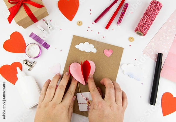 Fototapeta Valentine's Day. Instructions for making cards for Valentine's Day. Step 9 glue the heart ball to the base.