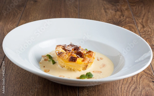 Obraz Cake pudding with vanilla sauce