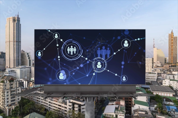 Fototapeta Glowing Social media icons on road billboard over panoramic city view of Bangkok, Southeast Asia. The concept of networking and establishing new connections between people and businesses.