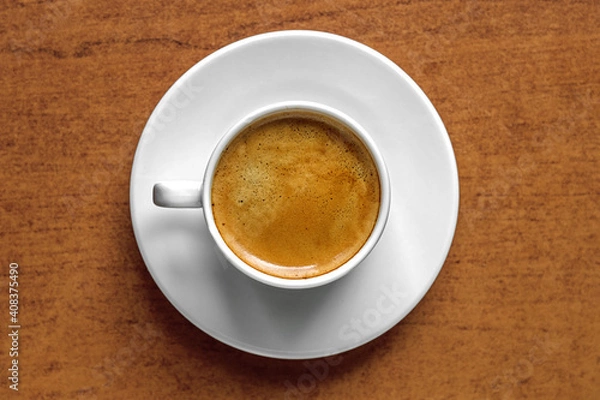 Fototapeta a cup of freshly brewed aromatic coffee