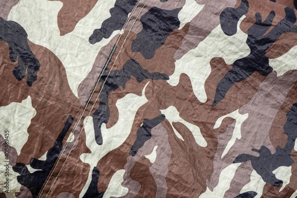 Fototapeta Detail of camouflage fabric pattern background. Stock Photo.