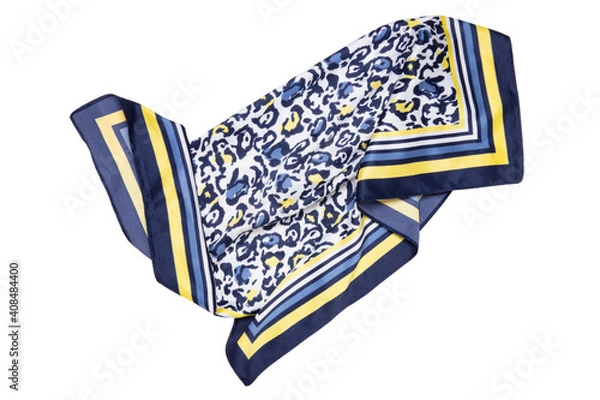 Obraz Silk scarf isolated. Closeup of a beautifully folded multicolored silk scarf or headscarf with a pattern isolated on a white background.