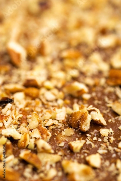Fototapeta nuts on chocolate toffee