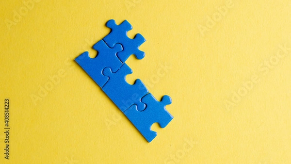 Obraz scattered puzzle pieces on colored background