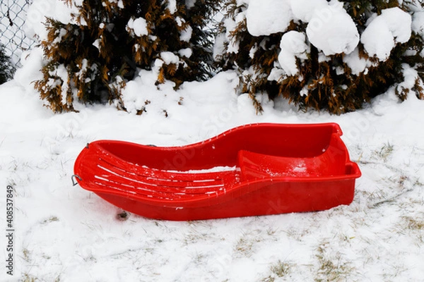 Obraz View of a red sledge in a winter landscape