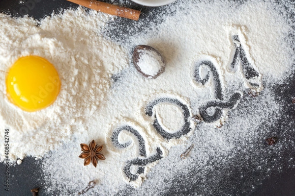 Fototapeta 2021 and everything for baking or desserts, all the ingredients and spices are for the home baker: honey, milk, eggs, sahor, flour, cinnamon, star anise.
