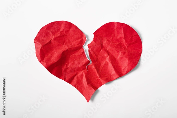Fototapeta Crumpled and torn red heart shape paper isolated on white background. Broken heart concept.