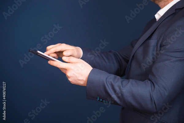 Fototapeta Businessman using tablet, double exposure with network