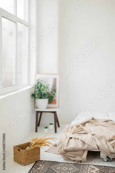 Fototapeta scandinavian style bed with large window