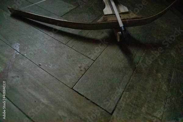 Fototapeta Close up of arrow and crossbow with copy space