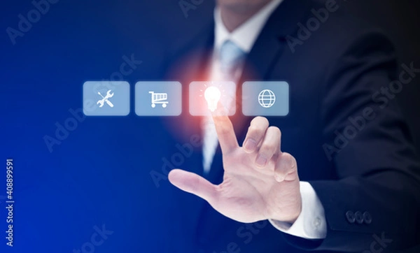 Fototapeta Businessman touching light bulb icon and Big data analytics visualization technology with chart and graph icons on a digital screen interface, science, information, analytics and innovation concept