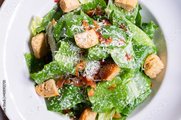 Fototapeta Caesar Salad with Cheese and Croutons