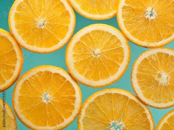 Fototapeta Closeup slice of orange fruit background,pattern background