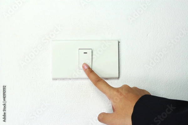 Fototapeta light power switch being turned on off