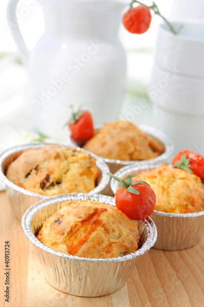 Fototapeta Muffins with dried tomatoes, cheese and ham