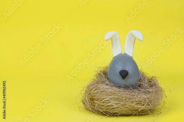 Fototapeta Easter. Easter eggs. The Easter bunny. The colors of 2021. Space for text