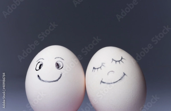 Obraz Chicken eggs with emoticons..