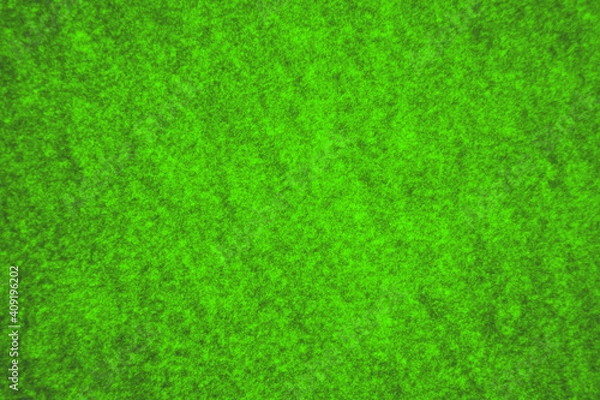 Fototapeta bright green acid background unique texture color young grass horizontal position