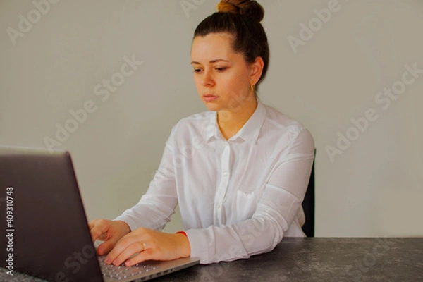 Fototapeta Accountant working on a computer