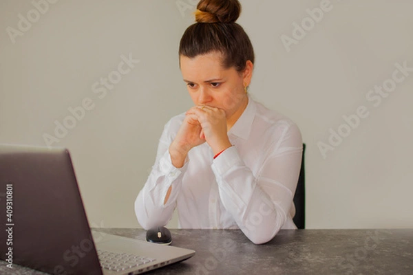 Fototapeta Office worker girl thinks over the project