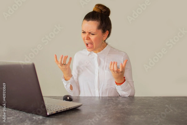 Fototapeta Angry accountant in front of the computer