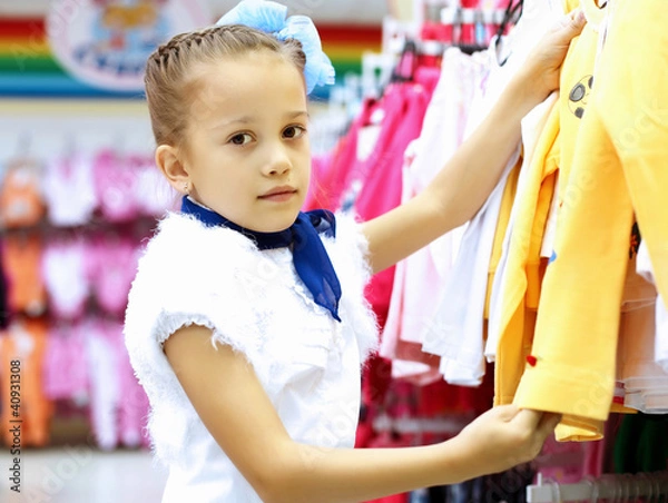 Fototapeta Young woman doing shopping