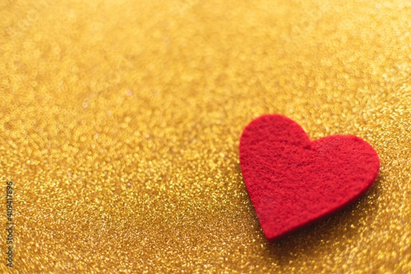 Fototapeta Red felt hearts on golden shiny background. Valentine's Day
