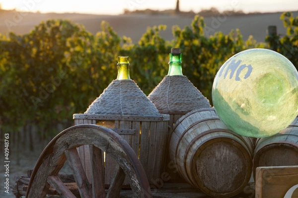 Fototapeta A cart loaded with wine bottles
