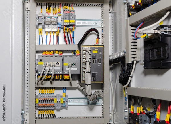 Fototapeta Electrical control box with electrical devices closeup