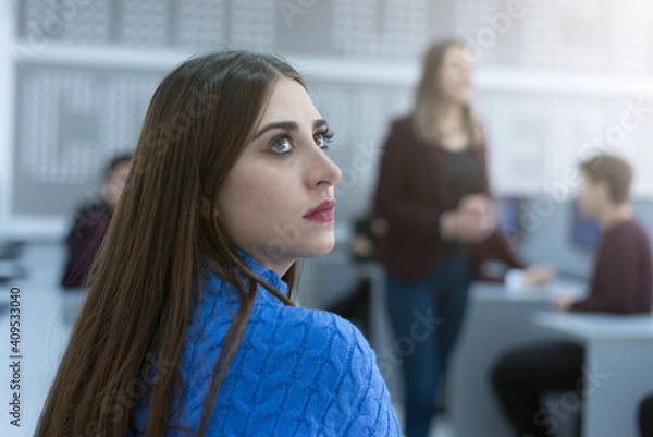 Obraz Young people in programming school. It student inside computer lab working on computer and programming practice lessons.