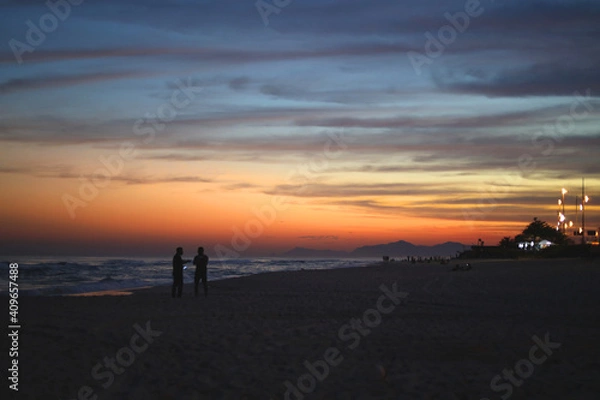 Obraz A talk at the sunset