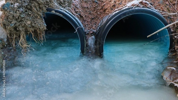 Obraz Frozen stream under a road