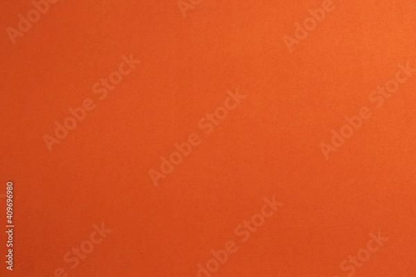 Fototapeta Close up Mottled orange paper background and texture. Orange paper with stripes of paper.