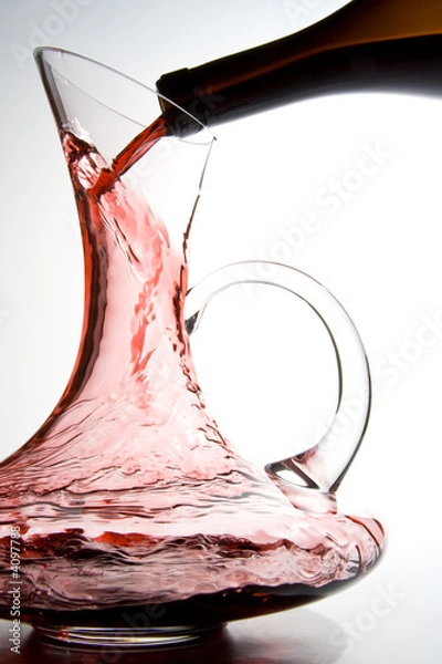 Obraz Wine pouring into decanter