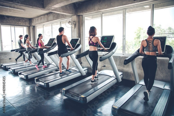 Obraz People jogging on treadmills.