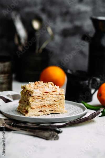 Fototapeta Napoleon cake in a plate on the table