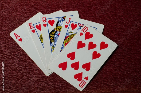 Obraz playing cards on red background 