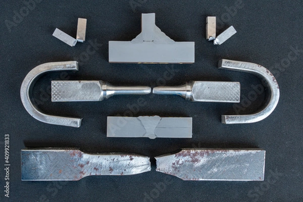 Fototapeta Steel from destructive testing (DT) is Bending test, Macro test, Tensile test and Impact test, on black background.
