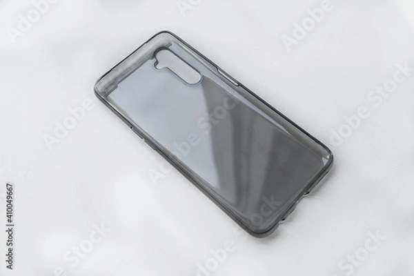 Obraz Transparent silicone smartphone case, close-up on white background