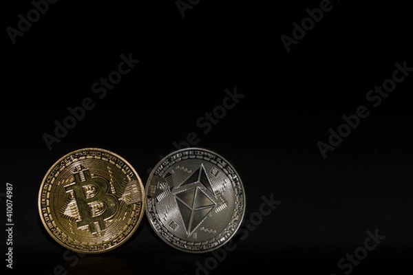 Fototapeta single bitcoin and ether coin with black background left