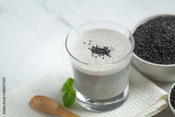 Obraz Soy milk mix black sesame on marble background