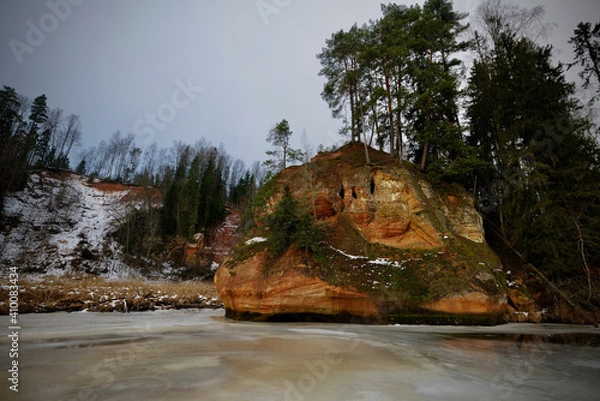 Obraz red sand stone by river