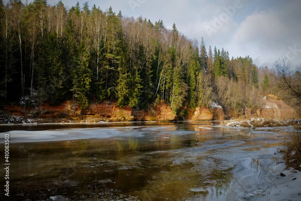 Obraz red sand stone by river