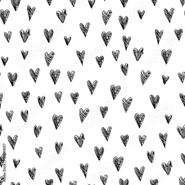 Fototapeta Black and white seamless pattern with doodle hearts. St Valentine day monochrome background in freehand technique.