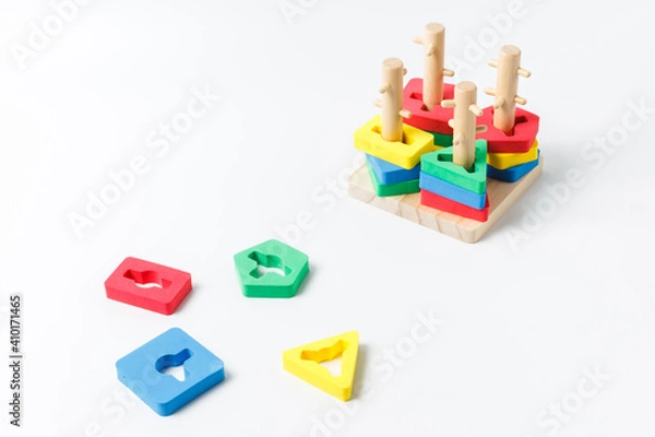 Fototapeta Children's logic game, puzzle. Colorful bright details, sorter. On a white background with space