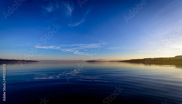 Fototapeta sunset over the river