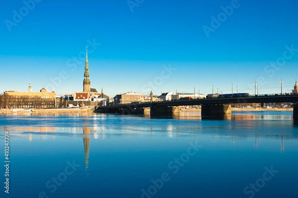 Obraz riga. in the photo, a panorama of the city against the blue sky