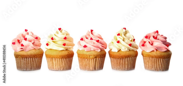 Fototapeta Row of tasty cupcakes for Valentine's Day on white background