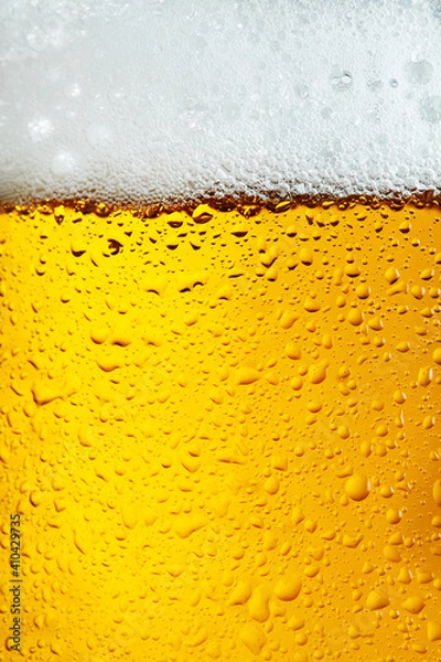 Fototapeta Beer background with bubble froth texture foam pouring alcohol soda in glass happy celebration party holiday new year concept object design