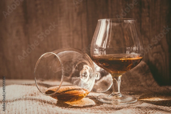 Fototapeta cognac, brandy whiskey bourbock in glasses